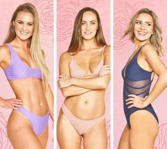 Three women in colorful bikinis against a pink floral background, smiling with confident poses.