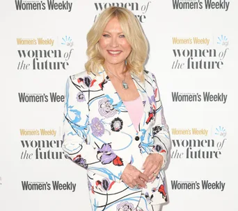 Kerri-Anne Kennerley at the Women of the Future event, wearing a floral blazer and smiling at the camera.