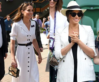 Two women in stylish outfits at an outdoor event; one in a white dress, the other in a white blazer and sunhat.