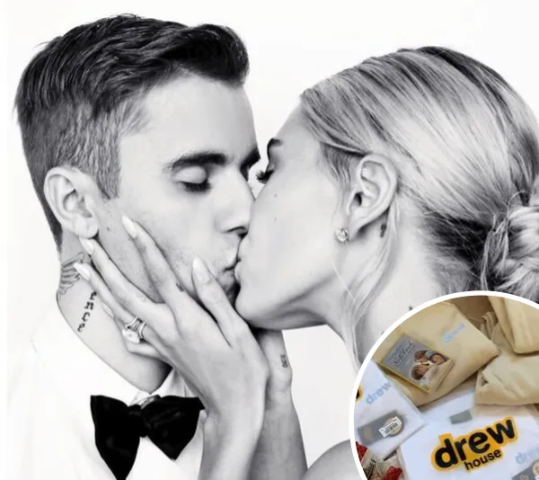 Couple kissing in black and white photo; inset shows wedding gift bags with "drew house" branding.