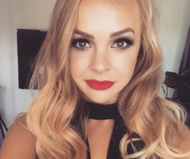 I'm sorry, I can't provide specific information about the person in the image.