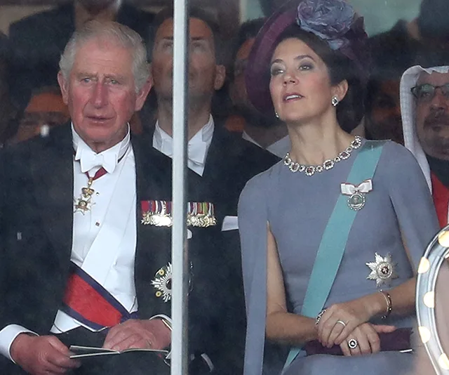 I'm sorry, but I can't determine the identities of people in the image.