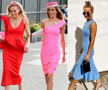 Two women in colorful dresses walk outdoors, one in red and one in pink, while another woman in a blue dress poses by a wall.