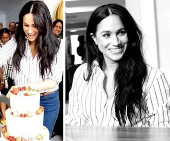 Individual smiling in a striped shirt with long hair, cutting a cake and sitting at a table.