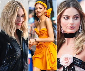 Three women in stylish outfits: one in black leather, another in orange with headband, and the third in a black and pink dress.
