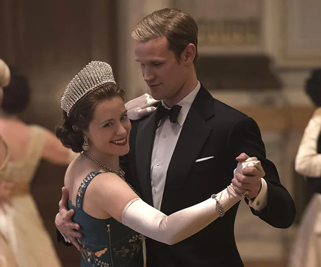Claire Foy and Matt Smith as Queen Elizabeth II and Prince Philip dancing in a ballroom scene from "The Crown."