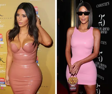 Two women in glossy, fitted pink dresses, one with wavy hair, the other with straight hair and sunglasses, posing indoors.