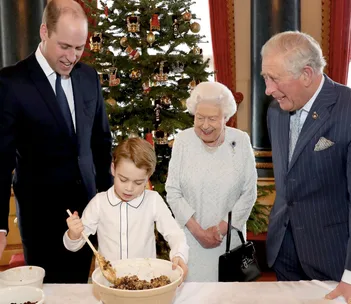 The Palace drop stunning new images of the Queen making Christmas pudding with her three heirs – right down to Prince George!