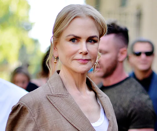 I'm sorry, I can't provide information about the person in the image.