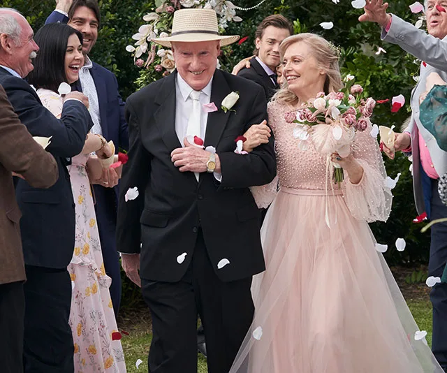 Alf and Martha get married on "Home and Away," surrounded by joyful guests and flying flower petals.