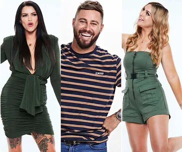 Three people posing: woman in green dress, man in striped shirt, woman in green romper, all smiling and standing.