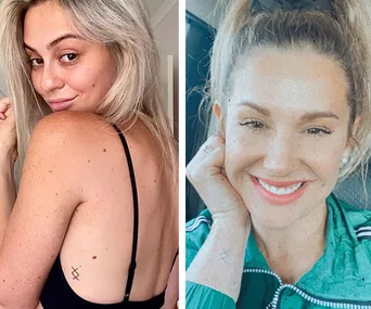 Two women with simple line tattoos; one on back, the other on wrist, both smiling.