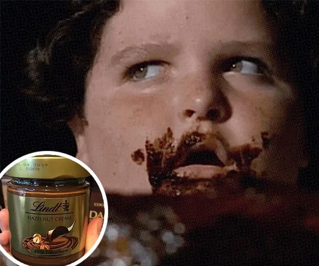 Boy with chocolate-covered face; inset of Lindt Hazelnut Cream jar.