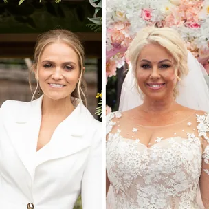 Women in wedding attire, left in white suit, right in white lace gown with floral backdrop.