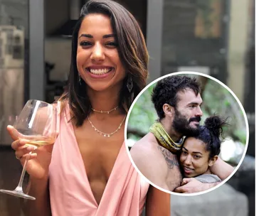 Smiling woman in a pink dress holding a wine glass; inset shows her hugging a bearded man outdoors.