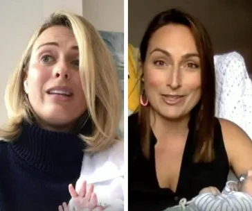 Women in a video call, each holding a baby, smiling and appearing to be at home.