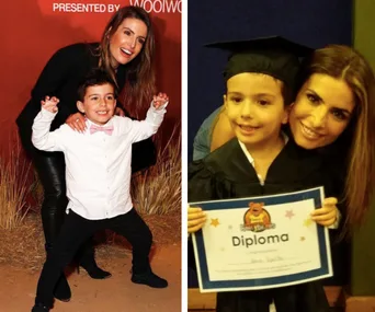 Woman and child pose at event; child in cap and gown holding diploma with woman smiling beside.