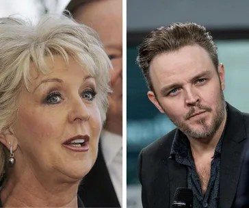 Portrait of a woman with blonde hair on the left and a man with short hair and beard on the right, both in conversation.