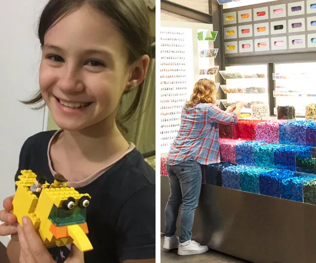 A girl happily holds a LEGO creation, while another person selects colorful bricks from a LEGO store display.