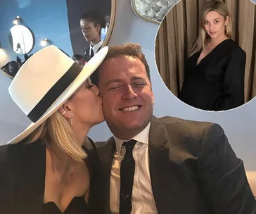Couple sitting together, woman in hat kisses man's cheek; inset shows woman in black dress, curtain background.