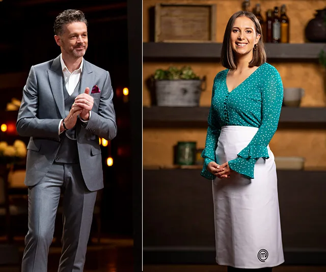 Two individuals in a culinary setting; one in a suit, the other in a green top with an apron.