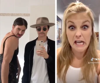 Two men in a mirror selfie; one in a dress, the other in a hat and sunglasses. Woman with a funny expression on the right.