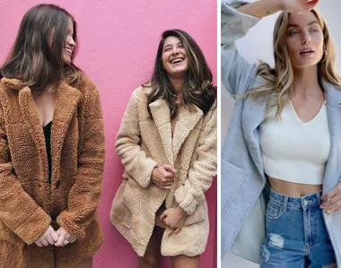 Women in stylish winter coats; two laugh against a pink wall, one poses in gray with a white top and jeans.
