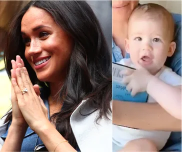 Meghan Markle smiling with hands clasped, next to a baby holding a book, both appear joyful and relaxed.