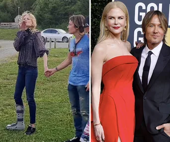 Nicole Kidman blows a kiss, wearing a foot brace, standing with Keith Urban; at an event in a red dress.