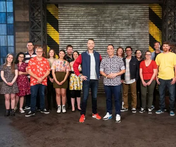Group photo of LEGO Masters Australia 2020 contestants and hosts standing together in a studio setting.