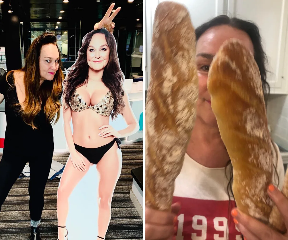 Kate Langbroek poses with a cardboard cutout in a bikini and holds two baguettes in front of her face.
