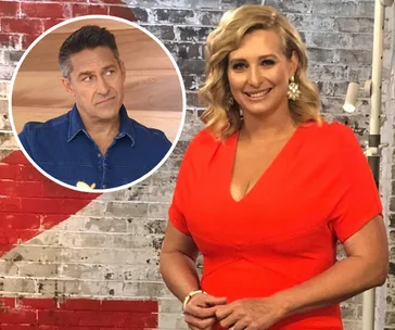 Two individuals inside a studio setting; one smiles in a red dress, the other looks pensive in a denim shirt.