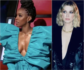 Two women in stylish outfits: one in a blue dress with puffed sleeves, and another in a black jacket and gold necklace.