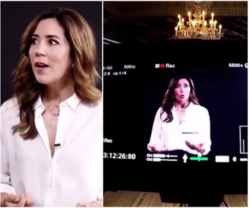 "Princess Mary in a white blouse speaking on camera, with studio lights and video screen in the background."