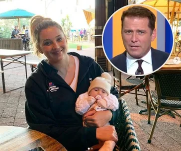 A woman holding a baby in an outdoor cafe; inset of a man in a suit speaking.
