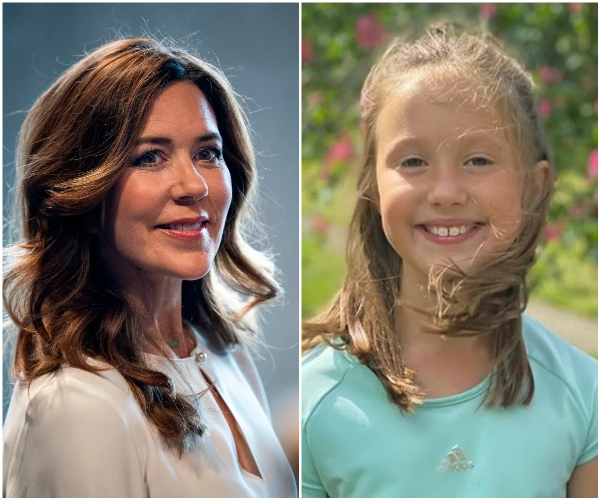 Two females are smiling; one adult with wavy hair and one child with a sporty outfit, outdoors with flowers in the background.