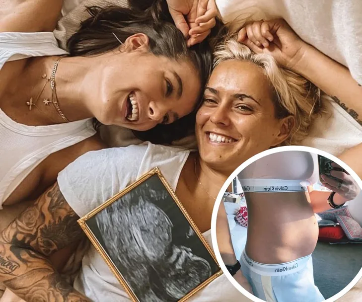 Two smiling individuals on a bed, one holding a baby ultrasound image; inset shows a pregnant belly.