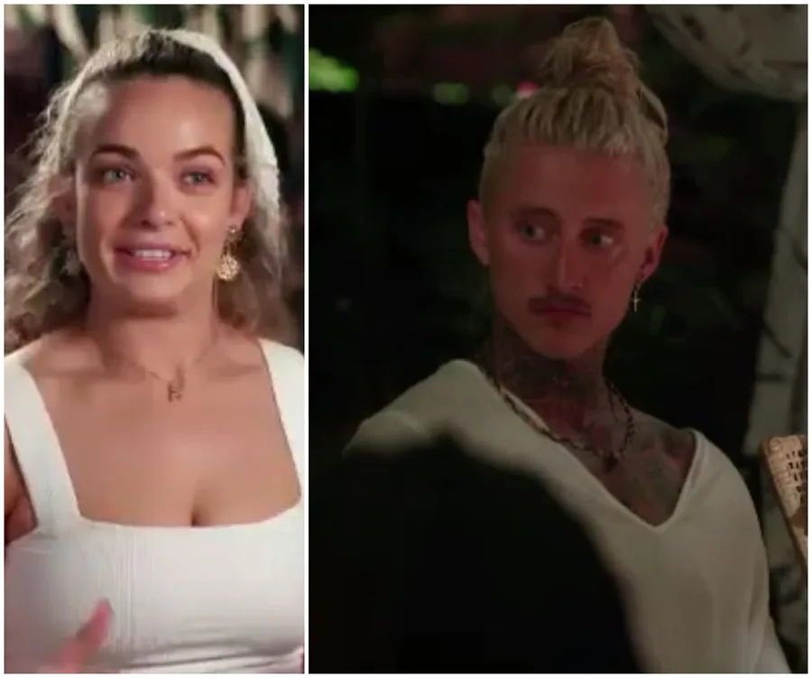 Two individuals in discussion on a reality TV show, wearing casual attire and sitting outdoors at night.