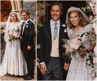 Princess Beatrice and her husband on their wedding day at a floral arch; she wears a tiara and holds a bouquet.