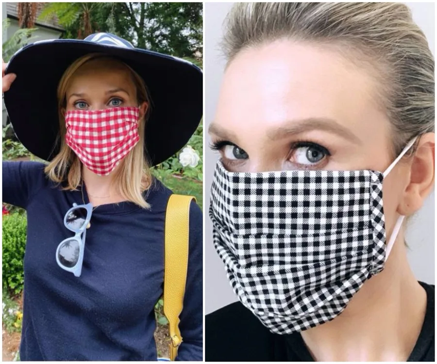 Women wearing face masks: one red and white checkered with a hat, another black and white checkered, close-up view.