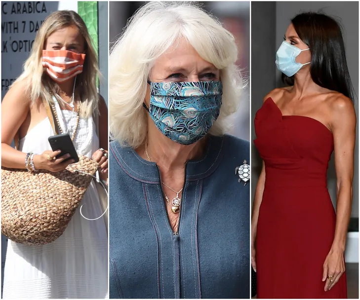 Three women wearing different patterned face masks; one with stripes, one with a blue pattern, and one in a plain mask.