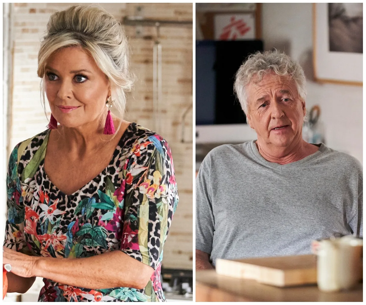 Two characters in discussion in a kitchen; one in a floral dress, the other in a gray shirt.