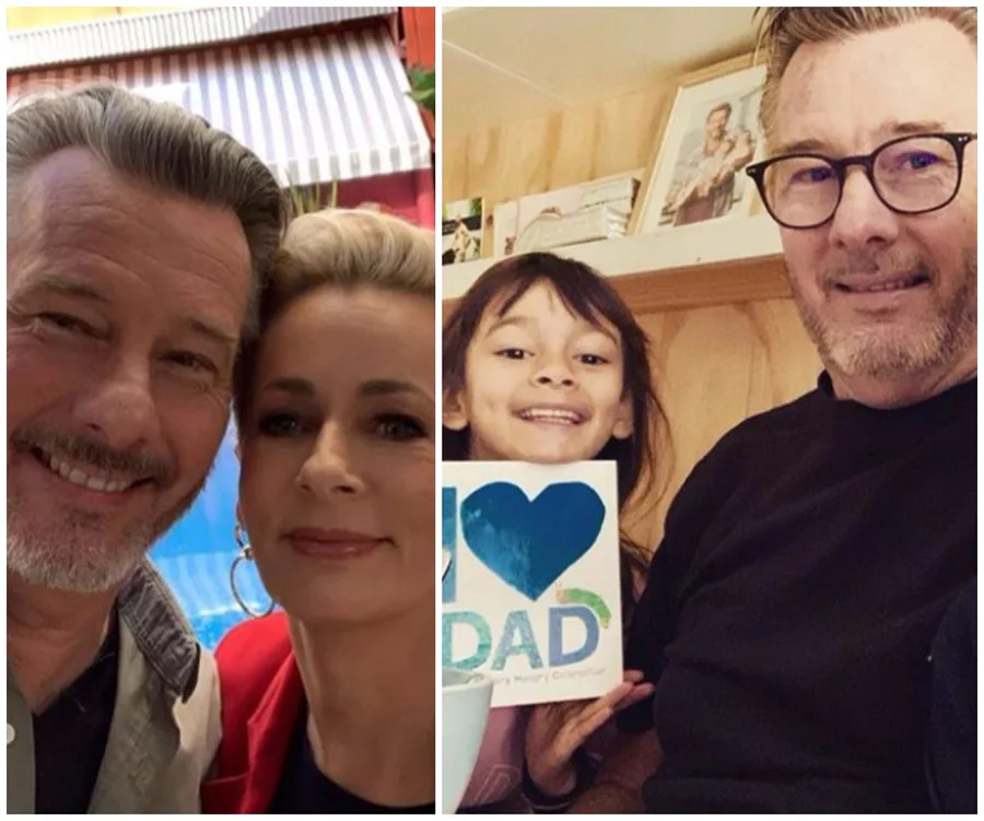 Barry Du Bois poses with a colleague and his child holding a "Love Dad" card, showing a heartfelt family moment.