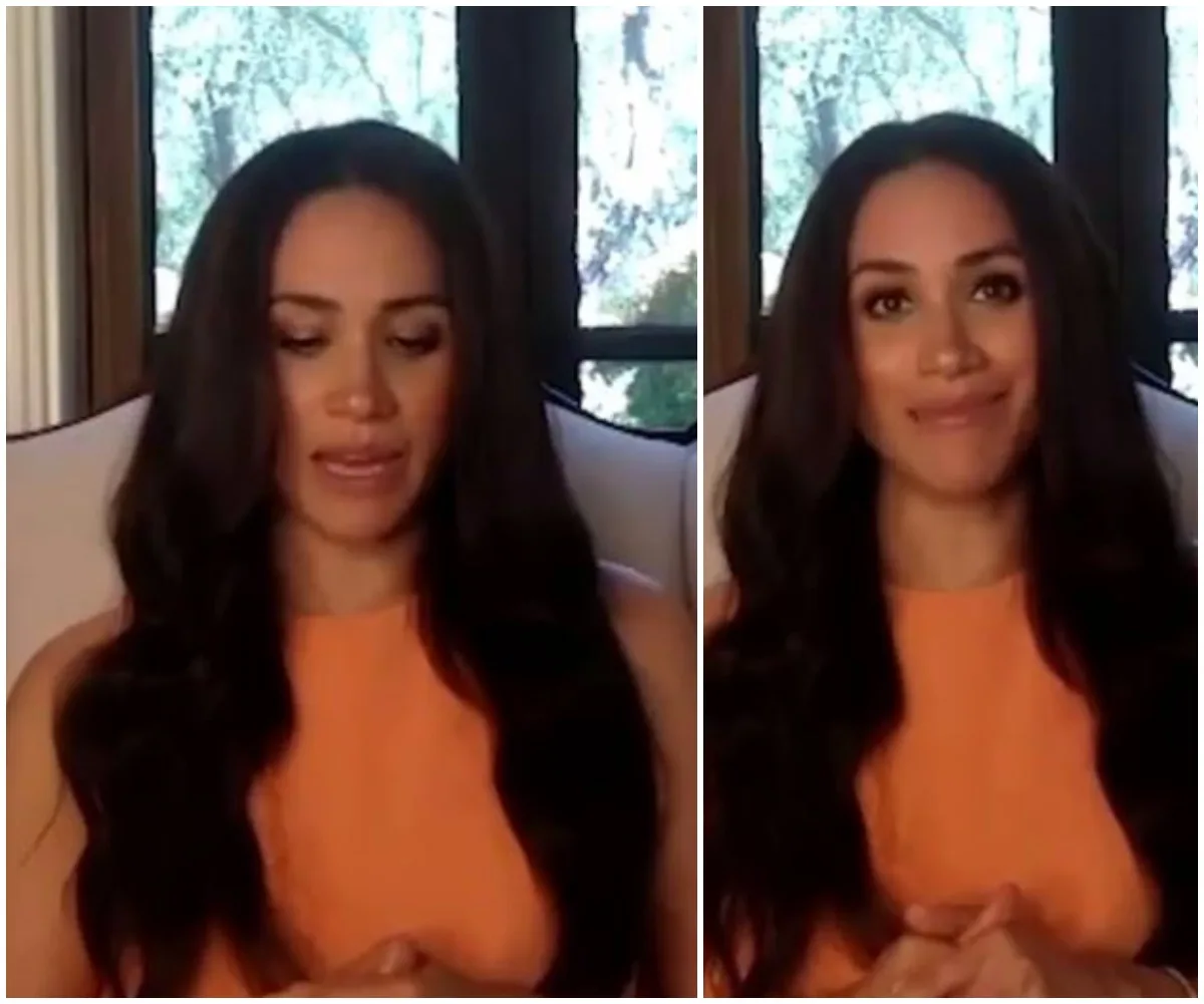 Meghan Markle in an orange top, speaking in a video call with a window and trees in the background.