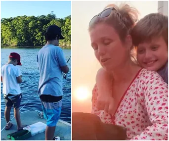 Two boys fishing by a lake; a woman with a child hugging her, both smiling at sunset.