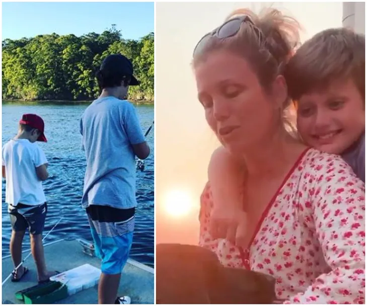 Two boys fishing by a lake; a woman with a child hugging her, both smiling at sunset.