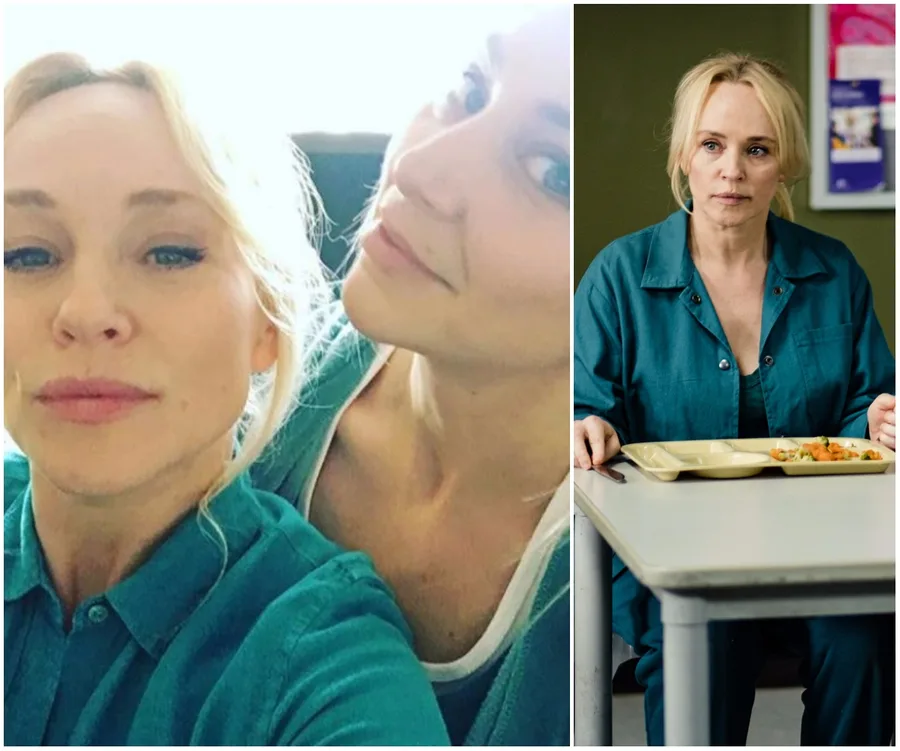 Two women in teal prison uniforms; one takes a selfie, the other sits at a table with a food tray.