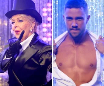 "Two performers in stage costumes; one in a top hat and the other shirtless, posing against a sparkly background."