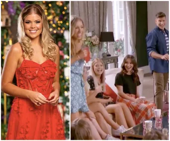 A woman in a red dress stands smiling; group of people laughing and talking in a cozy living room setting.