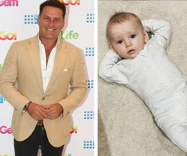 Man in beige suit smiling at event; baby in white onesie lying on carpet with hands behind head.
